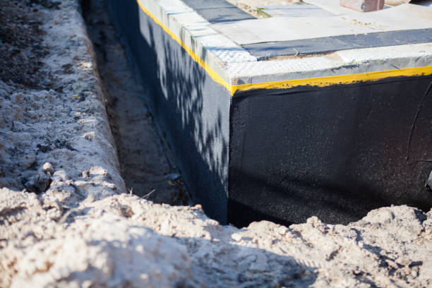 Professional Emergency Waterproofing technician working in Long Lake, MN
